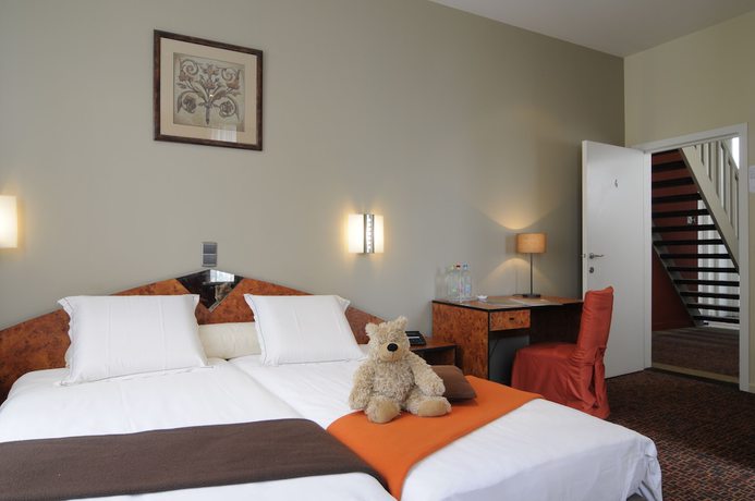 Imagen de la habitación del Hotel Grupello. Foto 15