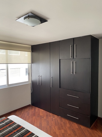 Imagen de la habitación del Hotel Grupo Kings Suites Chimborazo. Foto 7