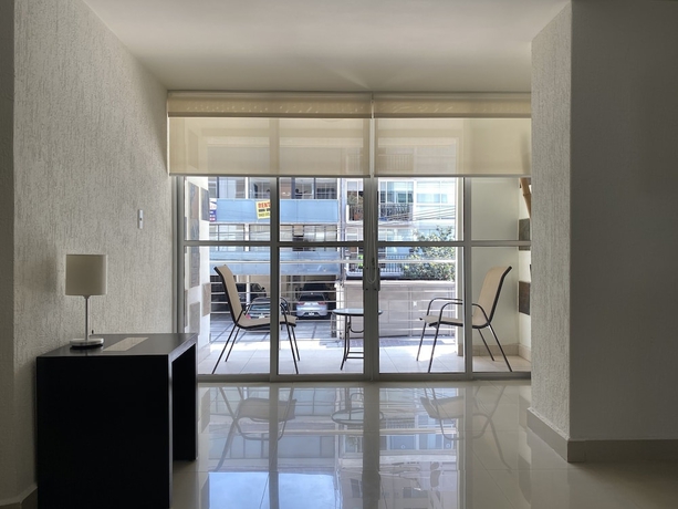 Imagen de la habitación del Hotel Grupo Kings Suites Chimborazo. Foto 14