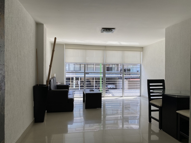 Imagen de la habitación del Hotel Grupo Kings Suites Chimborazo. Foto 15