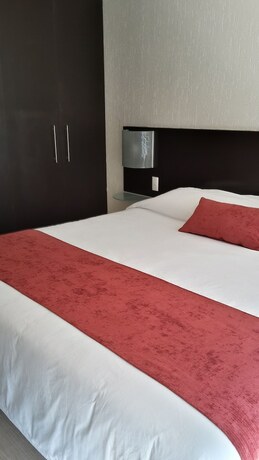 Imagen de la habitación del Hotel Grupo Kings Suites Duraznos. Foto 13