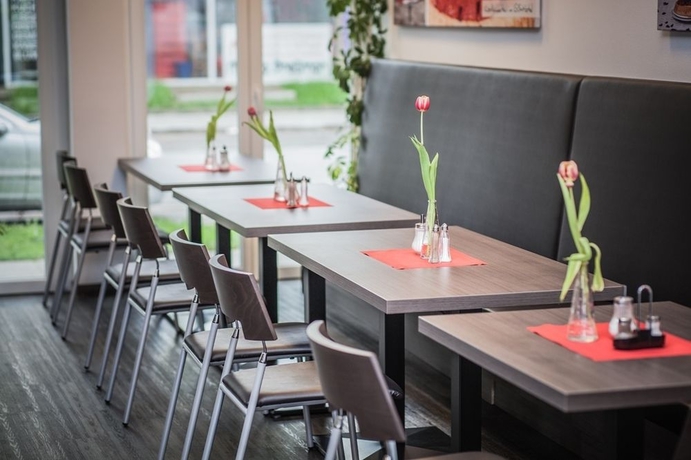 Imagen del bar/restaurante del Hotel Gs. Foto 3