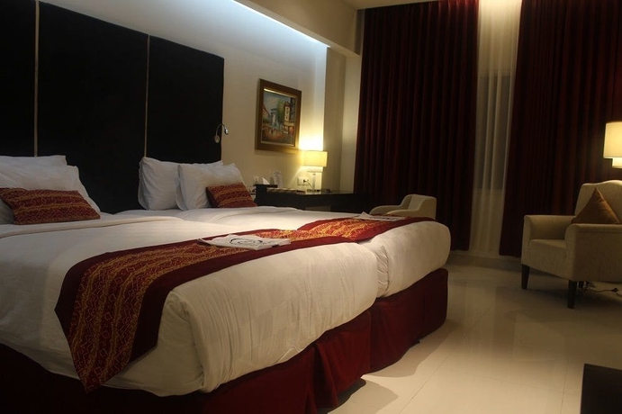 Imagen de la habitación del Hotel G'sign Banjarmasin. Foto 8