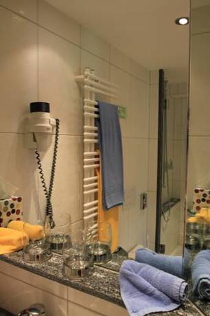Imagen de la habitación del Hotel Gspan. Foto 13