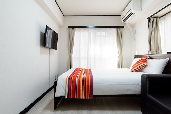 Imagen de la habitación del Hotel G-stays Shinjuku. Foto 18