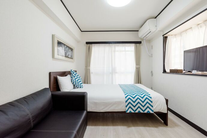 Imagen de la habitación del Hotel G-stays Shinjuku. Foto 19
