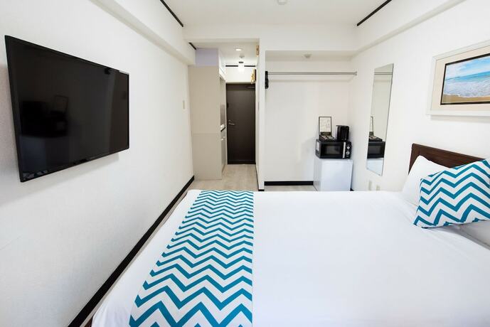 Imagen de la habitación del Hotel G-stays Shinjuku. Foto 21