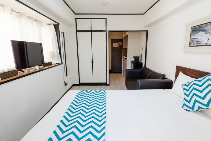 Imagen de la habitación del Hotel G-stays Shinjuku. Foto 31