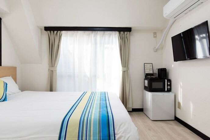 Imagen de la habitación del Hotel G-stays Shinjuku. Foto 32