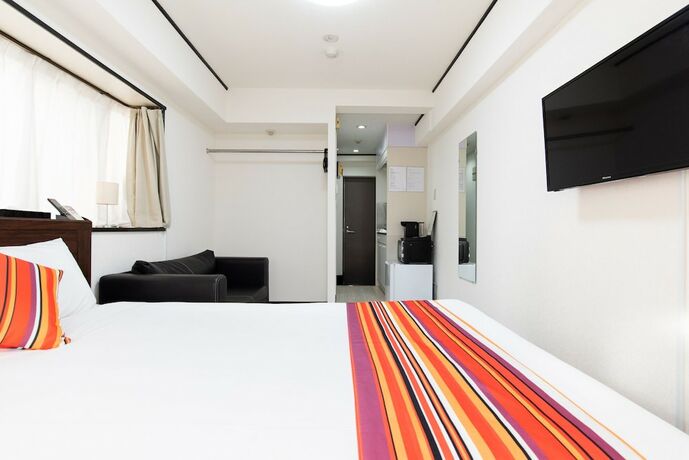 Imagen de la habitación del Hotel G-stays Shinjuku. Foto 38