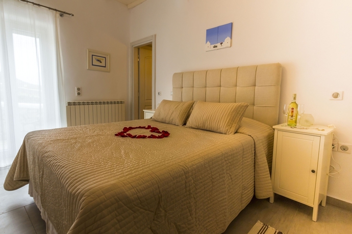 Imagen de la habitación del Hotel Gt Suites Corfos Bay. Foto 9