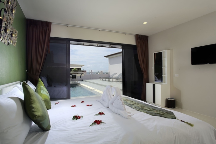 Imagen de la habitación del Hotel Gu Patong. Foto 11