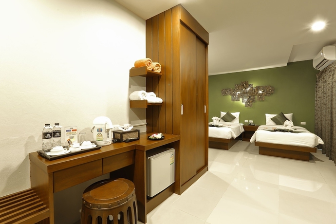 Imagen de la habitación del Hotel Gu Patong. Foto 16