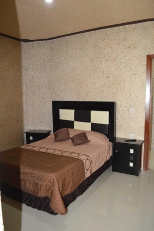 Imagen de la habitación del Hotel Guadalupe Bernal. Foto 10