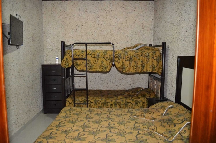 Imagen de la habitación del Hotel Guadalupe Bernal. Foto 13