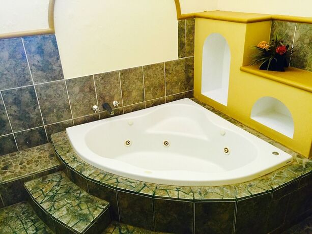 Imagen de la habitación del Hotel Guam&uacute;chil Parque Acu&aacute;tico and Caba&ntilde;as. Foto 14