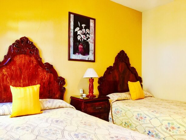 Imagen de la habitación del Hotel Guam&uacute;chil Parque Acu&aacute;tico and Caba&ntilde;as. Foto 15