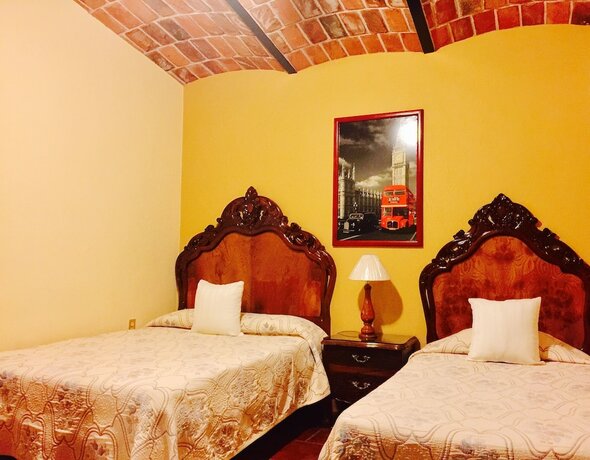 Imagen de la habitación del Hotel Guam&uacute;chil Parque Acu&aacute;tico and Caba&ntilde;as. Foto 16