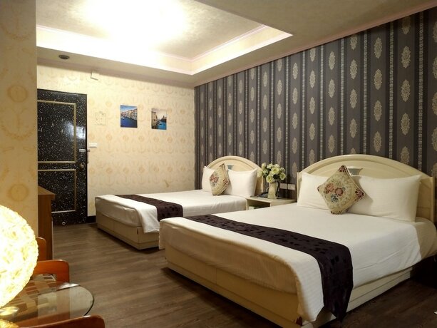 Imagen de la habitación del Hotel Guan Lun. Foto 16