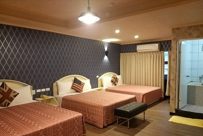 Imagen de la habitación del Hotel Guan Lun. Foto 26