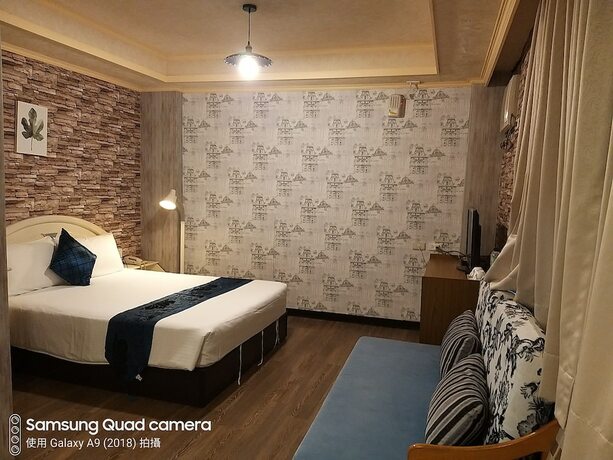 Imagen de la habitación del Hotel Guan Lun. Foto 31