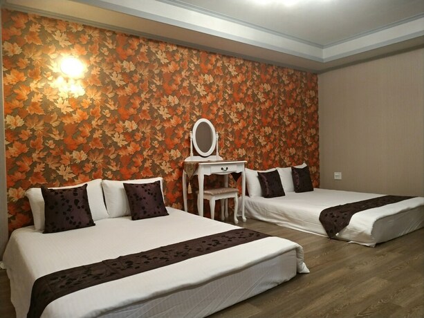 Imagen de la habitación del Hotel Guan Lun. Foto 36