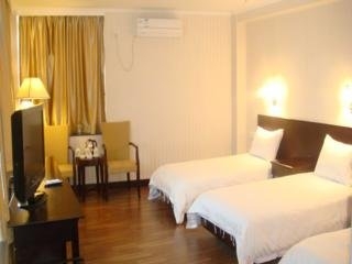 Imagen de la habitación del Hotel Guang Dong. Foto 1