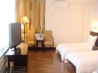Imagen de la habitación del Hotel Guang Dong. Foto 2