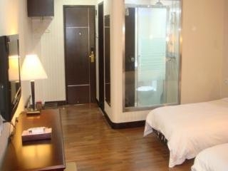 Imagen de la habitación del Hotel Guang Dong. Foto 3