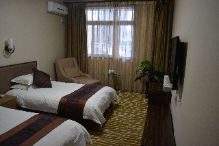 Imagen de la habitación del Hotel Guang Xi. Foto 2