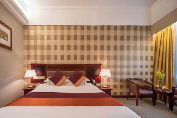 Imagen de la habitación del Hotel Guangdong Asia International. Foto 3