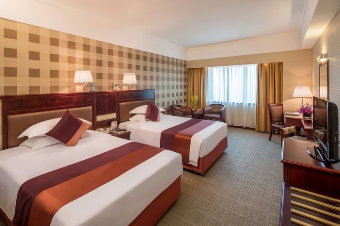 Imagen de la habitación del Hotel Guangdong Asia International. Foto 4