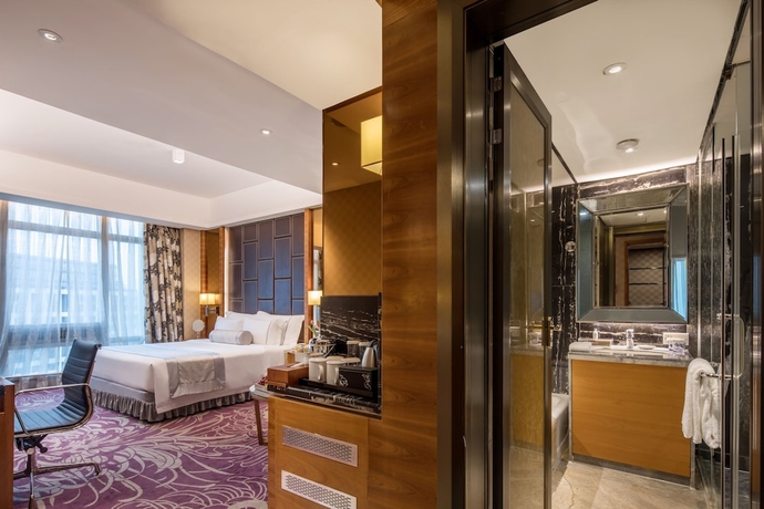 Imagen de la habitación del Hotel Guangdong Asia International. Foto 7