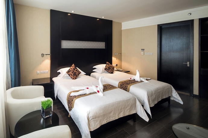 Imagen de la habitación del Hotel Guangdong Nanmei Osotto. Foto 2