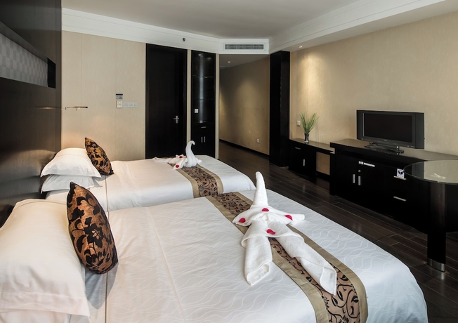 Imagen de la habitación del Hotel Guangdong Nanmei Osotto. Foto 3