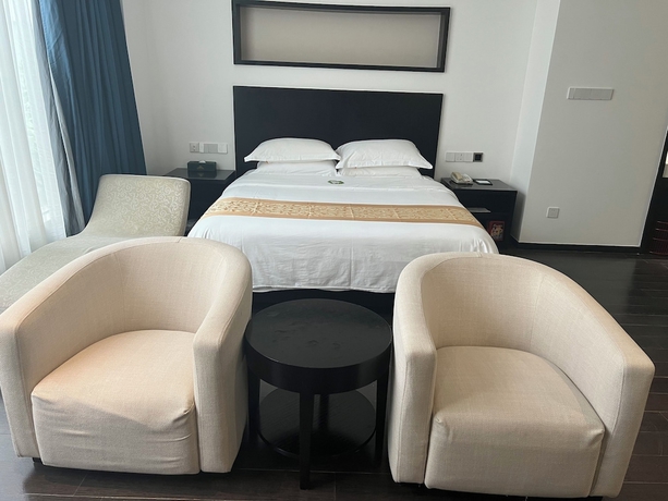 Imagen de la habitación del Hotel Guangdong Nanmei Osotto. Foto 7