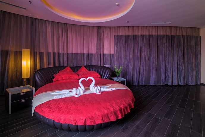 Imagen de la habitación del Hotel Guangdong Nanmei Osotto. Foto 10