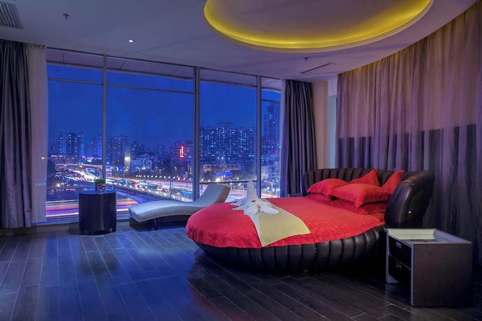 Imagen de la habitación del Hotel Guangdong Nanmei Osotto. Foto 11