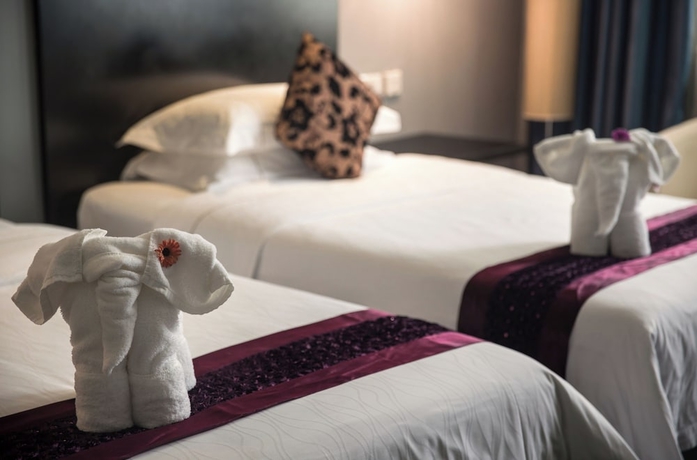 Imagen de la habitación del Hotel Guangdong Nanmei Osotto. Foto 13