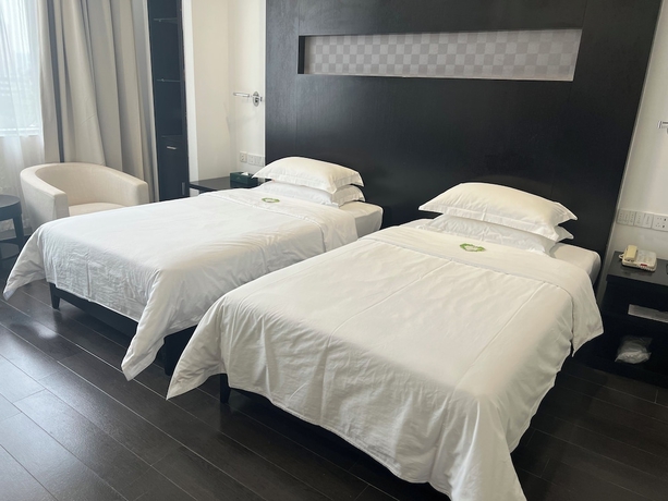 Imagen de la habitación del Hotel Guangdong Nanmei Osotto. Foto 14