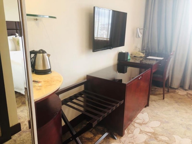 Imagen de la habitación del Hotel Guangdong Shanghai. Foto 8