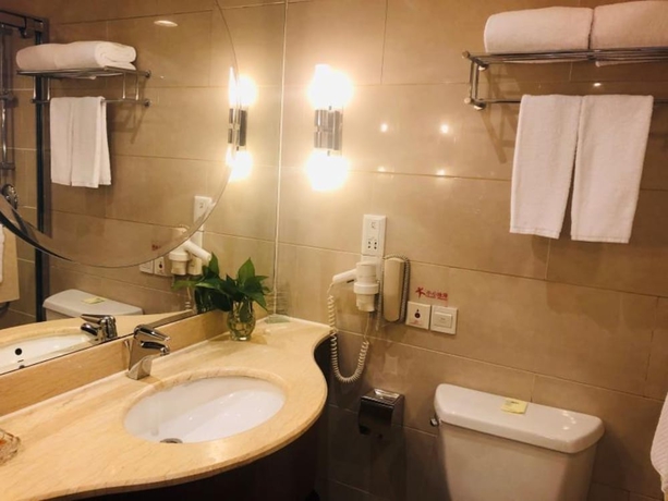 Imagen de la habitación del Hotel Guangdong Shanghai. Foto 14