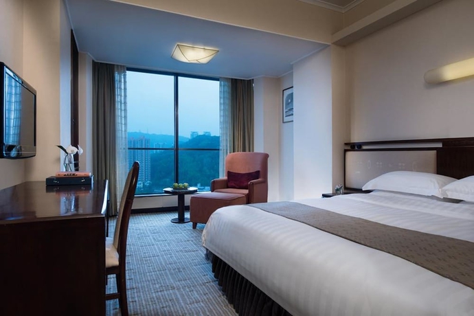 Imagen de la habitación del Hotel Guangdong Zhuhai. Foto 4
