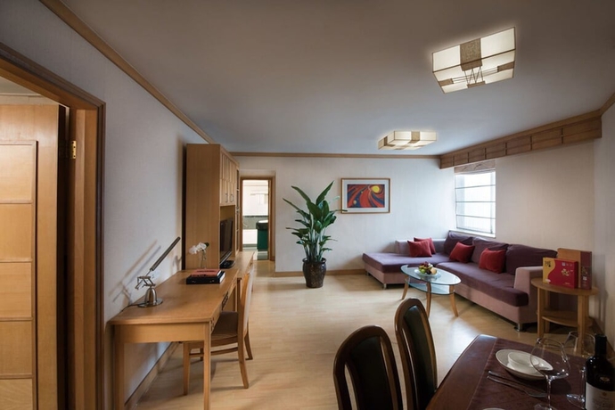 Imagen de la habitación del Hotel Guangdong Zhuhai. Foto 9