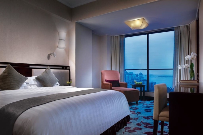 Imagen de la habitación del Hotel Guangdong Zhuhai. Foto 10