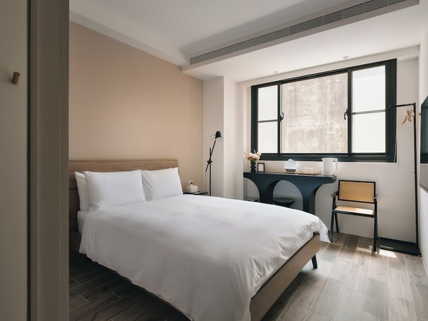 Imagen de la habitación del Hotel Guangfa. Foto 4