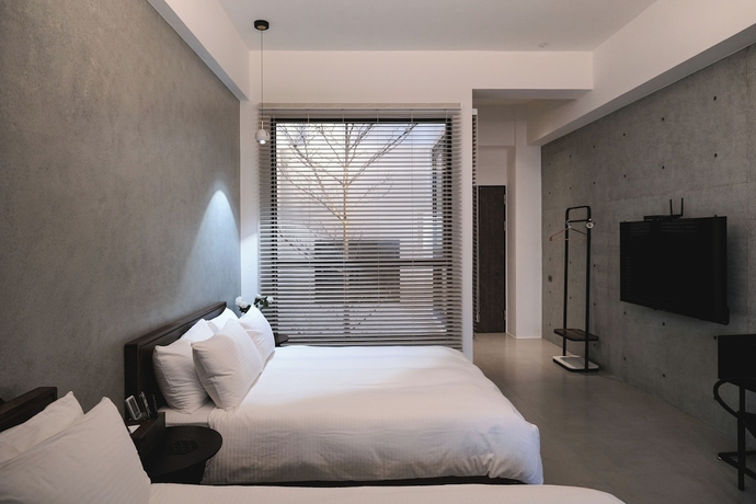 Imagen de la habitación del Hotel Guangfa. Foto 8