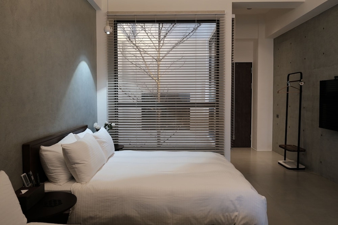 Imagen de la habitación del Hotel Guangfa. Foto 9