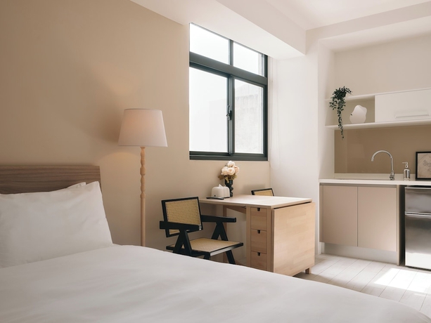 Imagen de la habitación del Hotel Guangfa. Foto 15