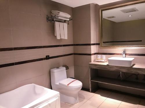 Imagen de la habitación del Hotel Guangxi Golden Holiday. Foto 5